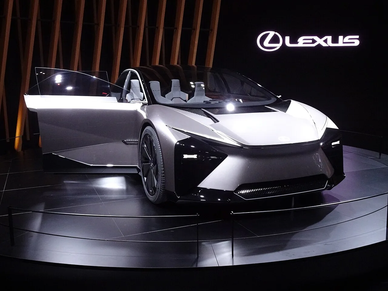 Lexus LF-ZC concept car on a stand with its doors open